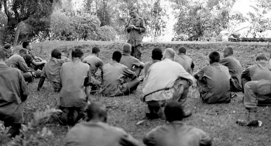 Father Vincent Capodanno, M.M. with soldiers